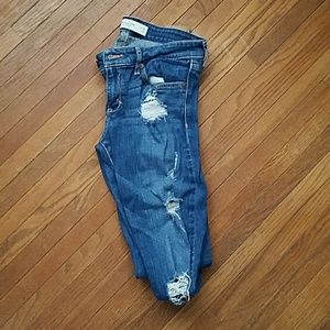 Distressed blue jeans